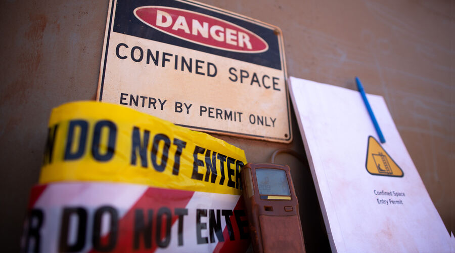 Construction site confined space signage and documentation