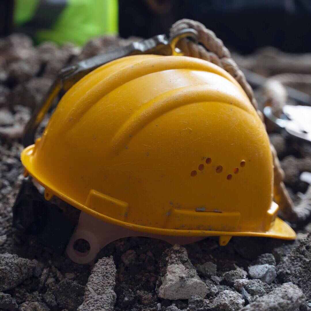 Helmet on a pile of rubble after a notifiable incident has occurred.